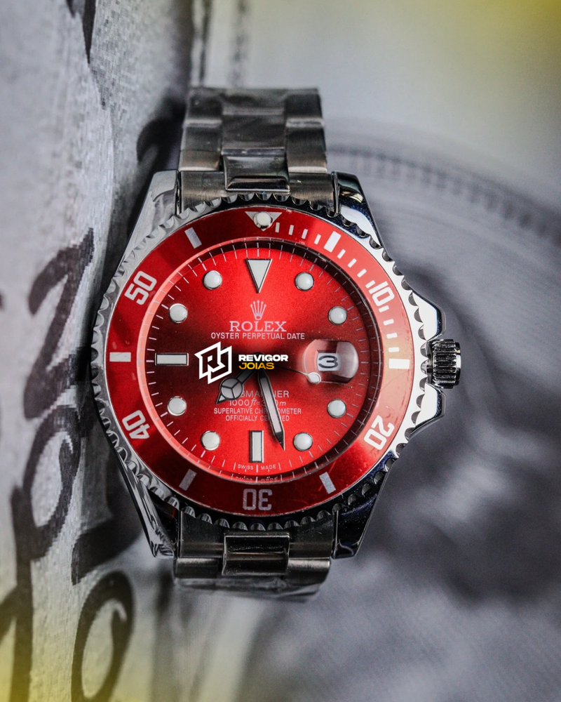 1ª Linha - Submariner Pulseira Oyster de aço fundo vermelho